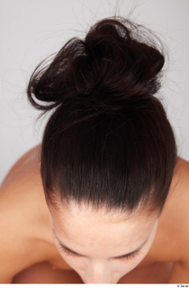 Suleika black hair messy bun 0001.jpg